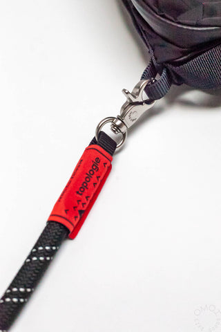 Topologie red logo tag on black rope strap with metal clips