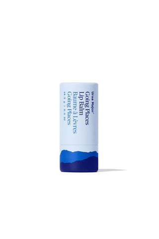 Sky-blue lip balm stick in a white tube with blue mountain graphic, yellow cap