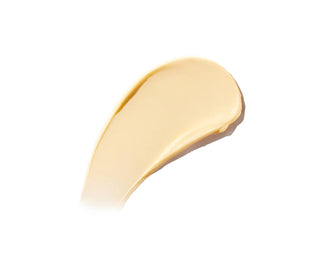 Pale yellow recovery cream swatch, thick texture on light background.