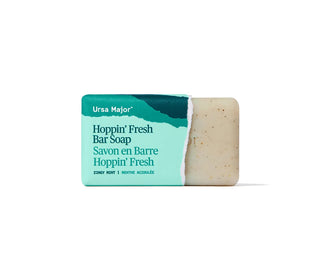 Cream bar soap with teal label reading Hoppin' Fresh Bar Soap