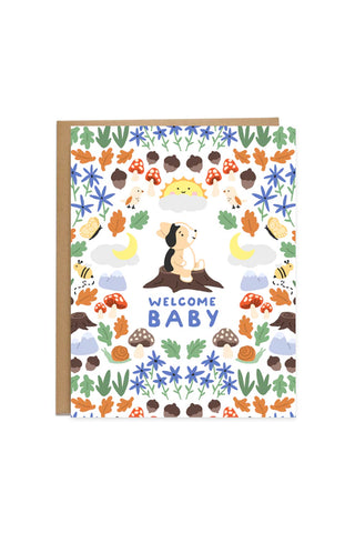 Woodlands welcome baby card with dog, mushrooms, trees, and WELCOME BABY text