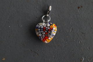 Heart-shaped millefiori glass charm with silver bail