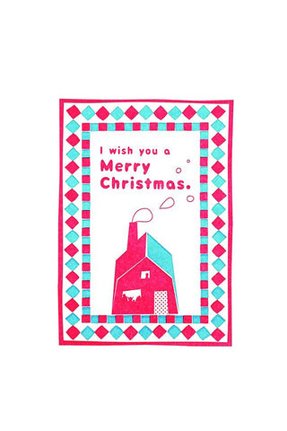 Christmas greeting card with diamond border, house illustration, and 'Merry Christmas' text