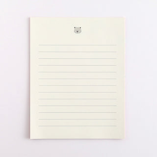 Cream letter card with a small gray wombat icon and multiple horizontal writing lines
