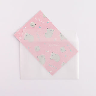 Pink wombat patterned letter sheet with lined accents inside a white envelope