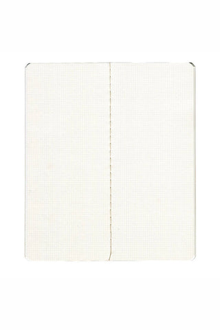 Open RO-BIKI grid notebook showing cream graph paper pages
