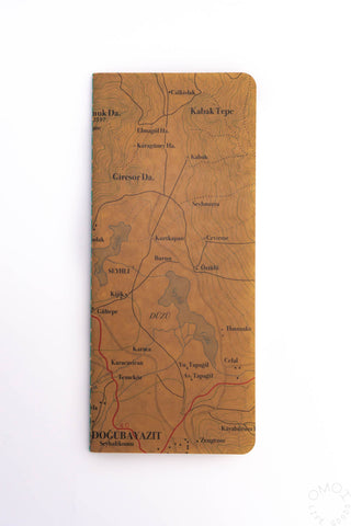 Topographical map notebook with brown cover and printed topographic routes