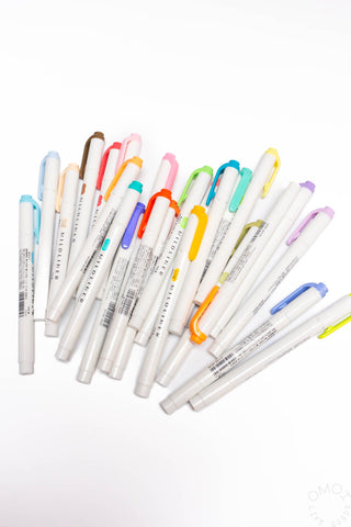 Assorted ZEBRA Mildliner highlighter pens, mixed bright and pastel colors