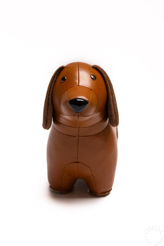 Tan dachshund bookend figurine, front view with dot eyes and floppy ears