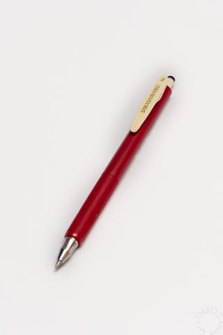 Red gel ink pen with metal tip and gold clip