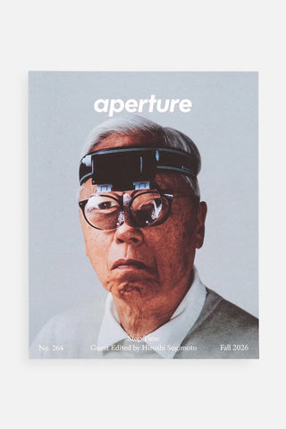 Photography magazine cover with 'aperture' title and portrait of man wearing glasses