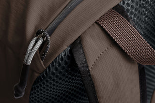 Daypack shoulder strap with zip pocket and textured mesh back panel