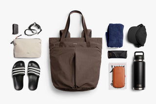 Bellroy tote bag in taupe with multiple carry items laid out around it