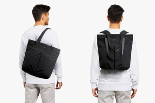 Black tote-to-backpack with front panel, adjustable shoulder straps, and top handle
