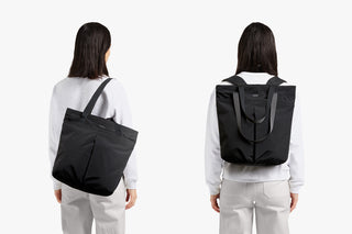 Black tote-to-backpack from back view with adjustable shoulder straps and top handle loops