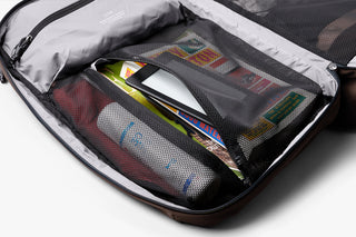 Bellroy travel backpack interior tray with cables, cards, and zipper mesh compartment