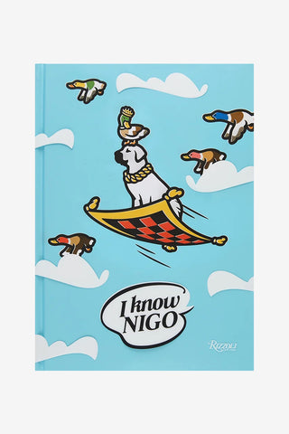 Illustrated book cover with cartoon surfer, clouds, and circular logo on blue