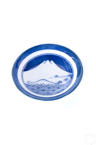 Blue mini ceramic plate with white inner ring and mountain and wave pattern
