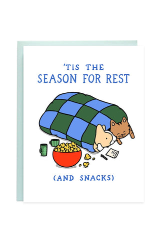 Holiday greeting card with blue text “Tis the Season for Rest” and snacks illustration