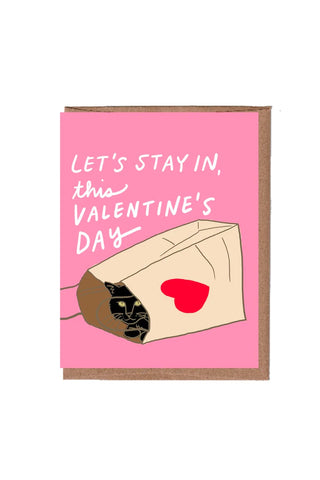 Valentine's Day card with black cat in a paper bag and pink lettering