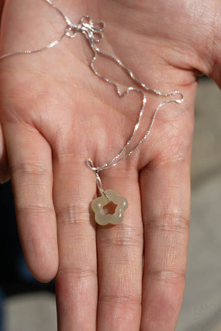 Jade flower pendant sterling silver necklace with chain, worn on hand