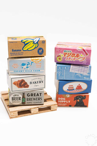 Food-themed sticker seal box set with mini cartons: bananas, bakery, beer, and dog supply