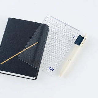 Hobonichi HON A5 pencil board with grid, clipped to planner with pen