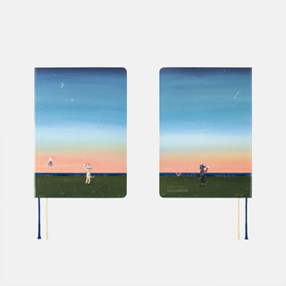 Two A6 planner covers with blue sky, sunset gradient, and dark green bottom