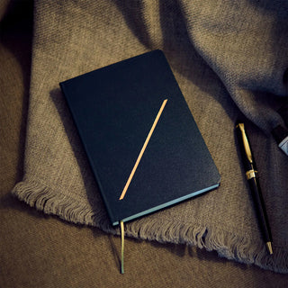 Hobonichi HON A6 slash planner, navy cover with gold diagonal stripe