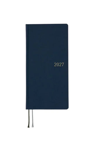Dark blue 2027 planner with elastic ties and “2027” on cover