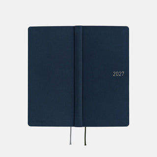 Closed midnight blue 2027 planner with spine seam and elastic ties
