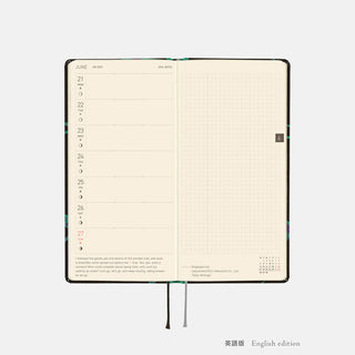 Open 2027 weeks planner showing weekly schedule layout on cream pages.
