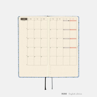 Open planner pages with graph grid squares and red accent bars