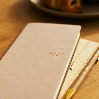 Hobonichi Techo WEEKS planner, smooth cafe au lait cover with 2027 on front