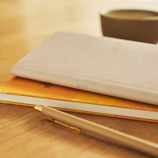 Hobonichi Techo WEEKS planner in smooth café au lait cover