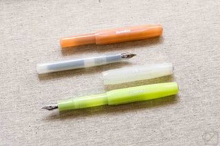 Kaweco Sport frosted fruit fountain pen, orange and green bodies with nib tips shown