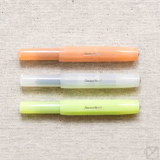 Kaweco Sport frosted fruit fountain pens, orange, coconut white, and lime green bodies