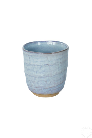 Kinyou light blue textured ceramic teacup with brown base