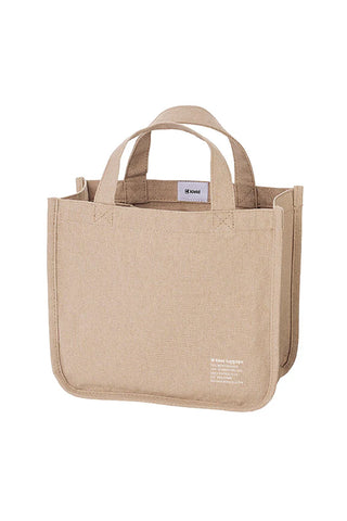 Beige canvas tool tote with two top handles, reinforced sides, and front label patch.