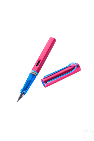 LAMY AL-Star fountain pen with cap off, pink and blue, fine nib exposed