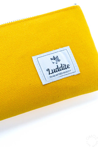 Yellow pen case with Luddite logo label patch