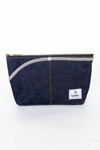 Denim boat pouch with double pockets, zip-top, and stitched white trim