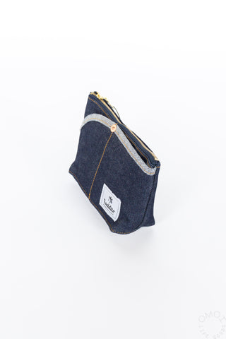 Small denim boat pouch with gold zipper, front logo patch, curved side view
