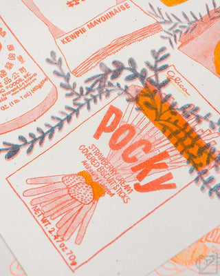 Close-up snack-themed print with "POCKY" in orange text and striped accents