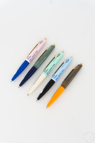 Set of mini ballpoint pens in blue, navy, beige, black, and orange