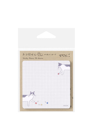 Cat-and-ball die-cut sticky note pad with light grid paper squares