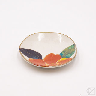 Mini ceramic plate with red-orange flower and green leaf illustration