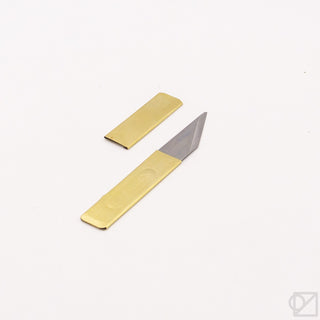 Small brass knife with exposed silver blade and brass cover