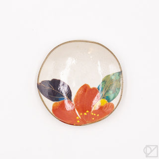 Mini ceramic plate with white base and orange-red flower artwork