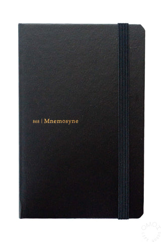 Hard cover notebook with elastic band, dark cover and black spine edge